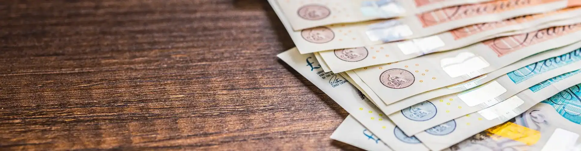 UK bank notes on a table.